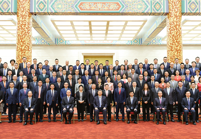 习近平会见第十届世界华侨华人社团联谊大会代表(图2)